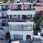 Suna Suits Home