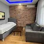 Taksim Camdali Suit